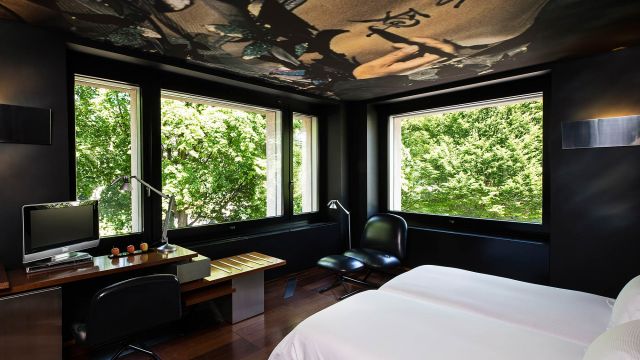 Corner Junior Suite The Hotel Lucern Sleeping Area in the green Countryside